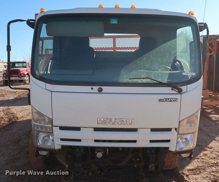 image for item GD9921 2015 Isuzu NPR flatbed truck