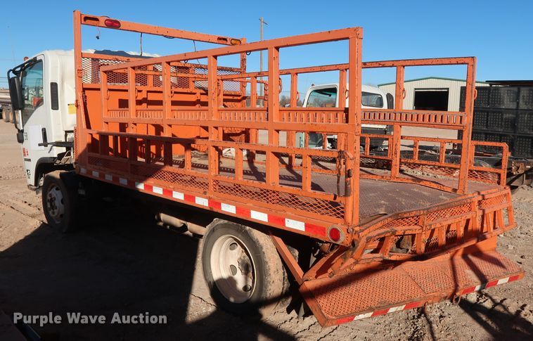 image for item GD9921 2015 Isuzu NPR flatbed truck