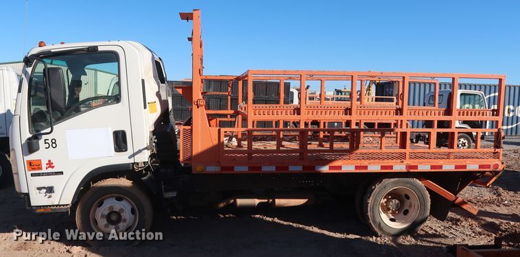 image for item GD9921 2015 Isuzu NPR flatbed truck