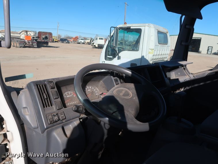 image for item GD9921 2015 Isuzu NPR flatbed truck