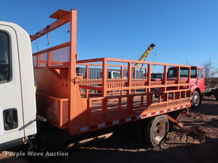 image for item GD9921 2015 Isuzu NPR flatbed truck