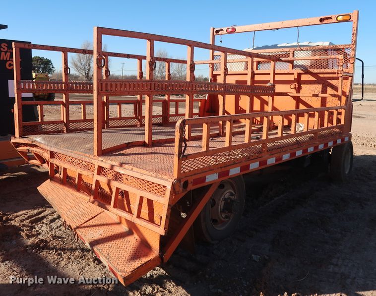 image for item GD9921 2015 Isuzu NPR flatbed truck