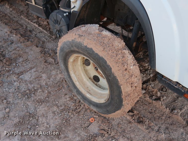 image for item GD9921 2015 Isuzu NPR flatbed truck