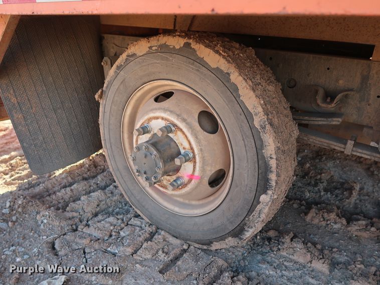 image for item GD9921 2015 Isuzu NPR flatbed truck