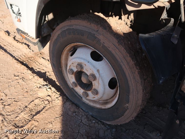 image for item GD9921 2015 Isuzu NPR flatbed truck