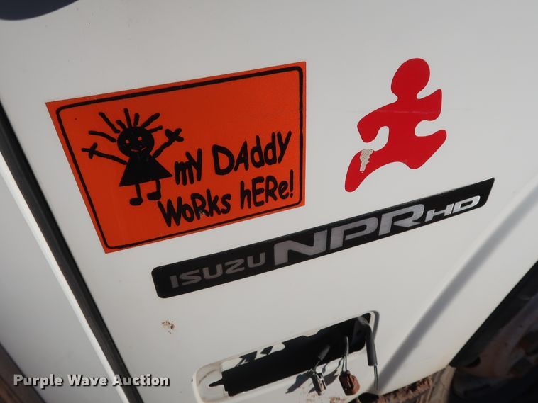 image for item GD9921 2015 Isuzu NPR flatbed truck