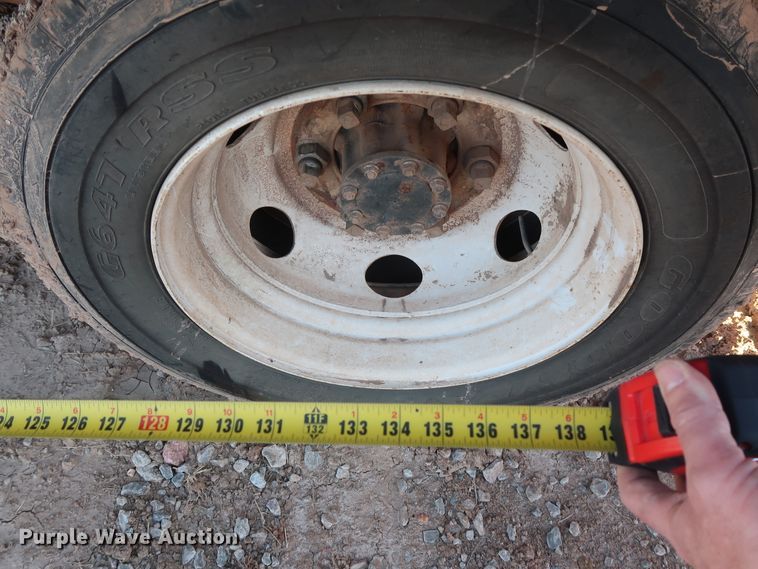 image for item GD9921 2015 Isuzu NPR flatbed truck