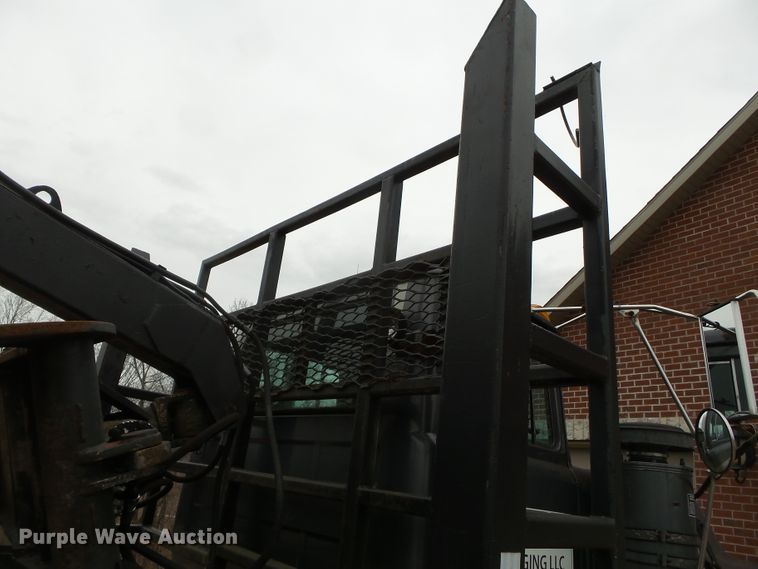 image for item DH7836 1999 Mack DM690S log loader truck