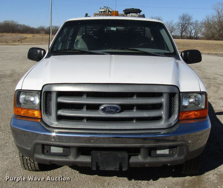 image for item DH8332 1999 Ford F250 Super Duty SuperCab utility bed pickup truck