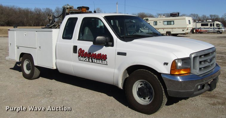 image for item DH8332 1999 Ford F250 Super Duty SuperCab utility bed pickup truck