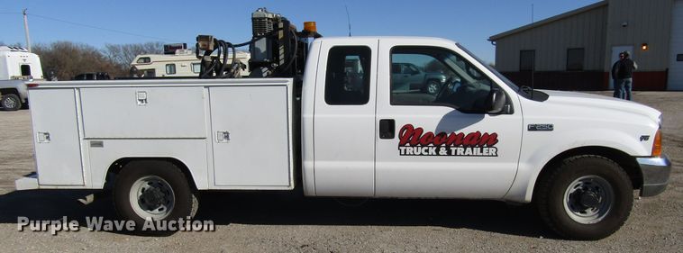 image for item DH8332 1999 Ford F250 Super Duty SuperCab utility bed pickup truck