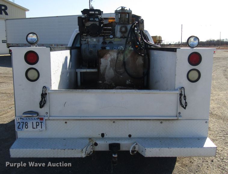 image for item DH8332 1999 Ford F250 Super Duty SuperCab utility bed pickup truck