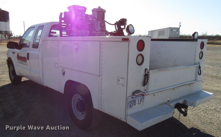 image for item DH8332 1999 Ford F250 Super Duty SuperCab utility bed pickup truck