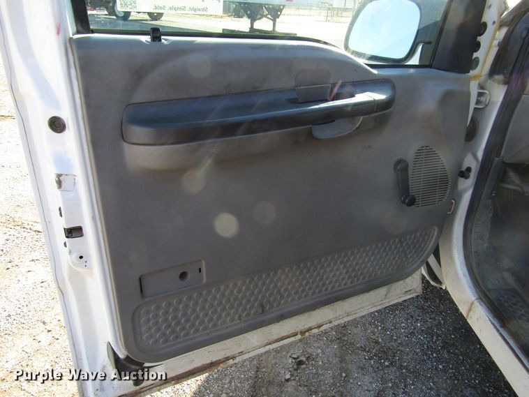 image for item DH8332 1999 Ford F250 Super Duty SuperCab utility bed pickup truck