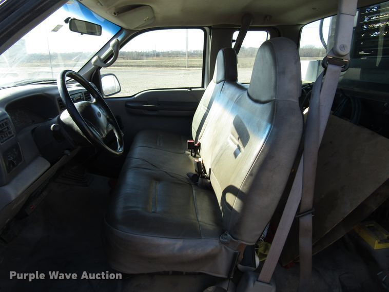 image for item DH8332 1999 Ford F250 Super Duty SuperCab utility bed pickup truck