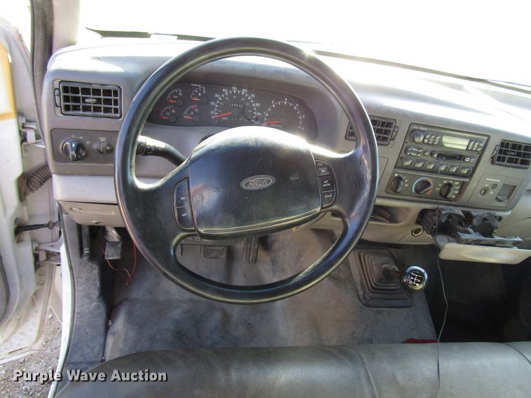 image for item DH8332 1999 Ford F250 Super Duty SuperCab utility bed pickup truck