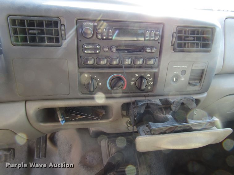 image for item DH8332 1999 Ford F250 Super Duty SuperCab utility bed pickup truck