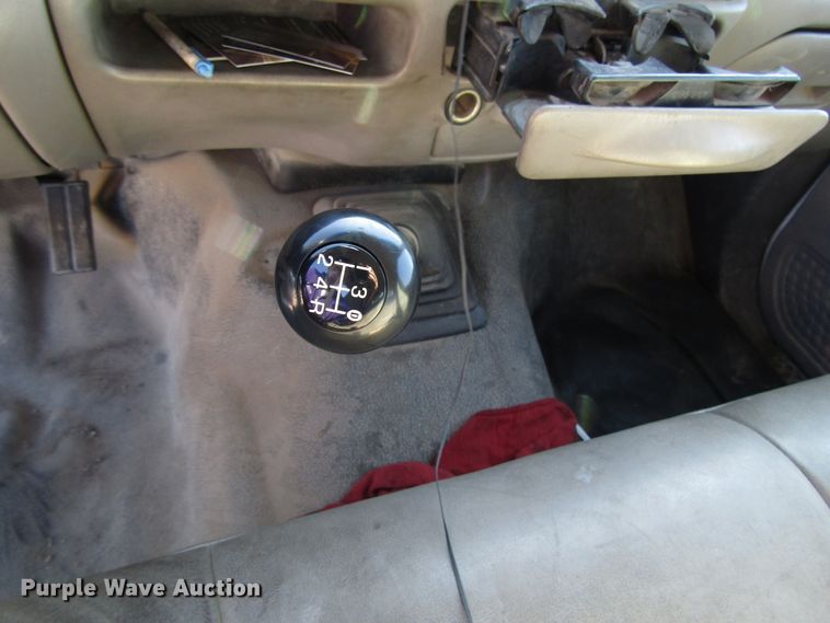 image for item DH8332 1999 Ford F250 Super Duty SuperCab utility bed pickup truck