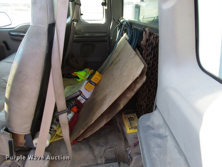 image for item DH8332 1999 Ford F250 Super Duty SuperCab utility bed pickup truck