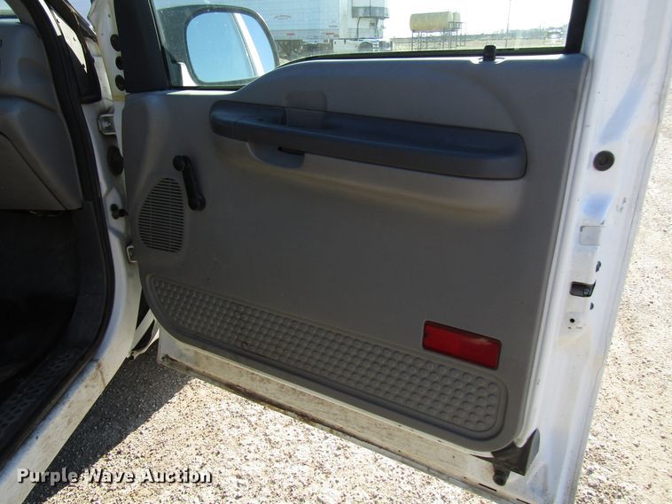 image for item DH8332 1999 Ford F250 Super Duty SuperCab utility bed pickup truck