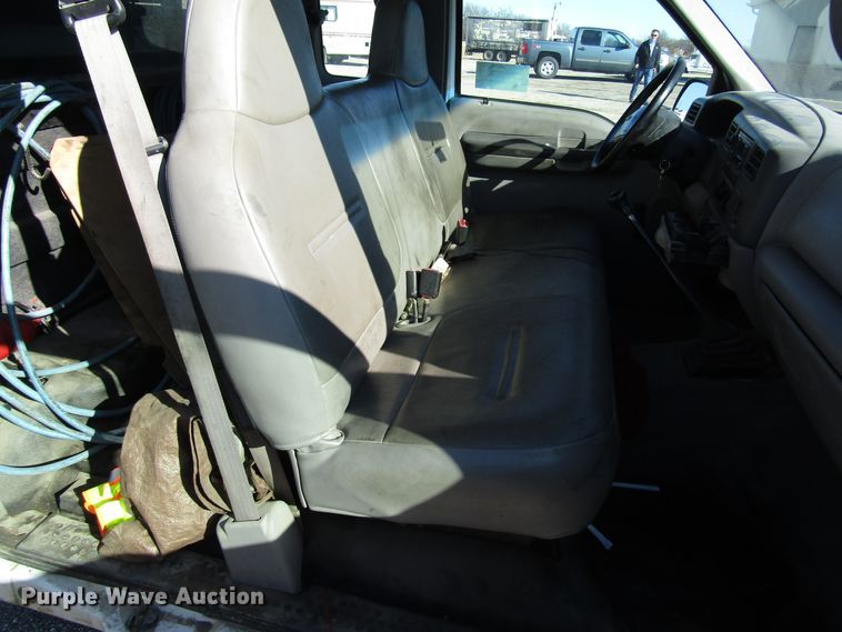 image for item DH8332 1999 Ford F250 Super Duty SuperCab utility bed pickup truck