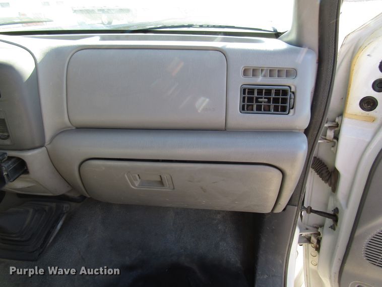 image for item DH8332 1999 Ford F250 Super Duty SuperCab utility bed pickup truck