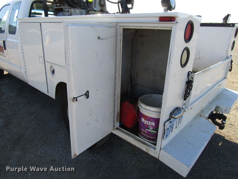 image for item DH8332 1999 Ford F250 Super Duty SuperCab utility bed pickup truck