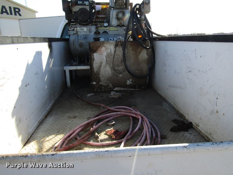 image for item DH8332 1999 Ford F250 Super Duty SuperCab utility bed pickup truck