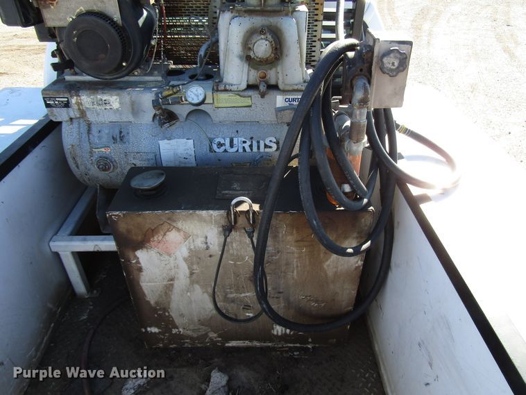 image for item DH8332 1999 Ford F250 Super Duty SuperCab utility bed pickup truck