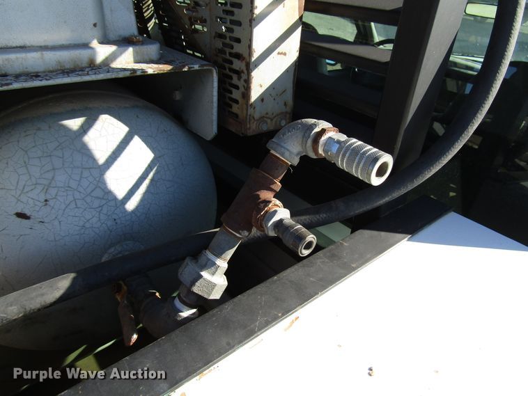 image for item DH8332 1999 Ford F250 Super Duty SuperCab utility bed pickup truck