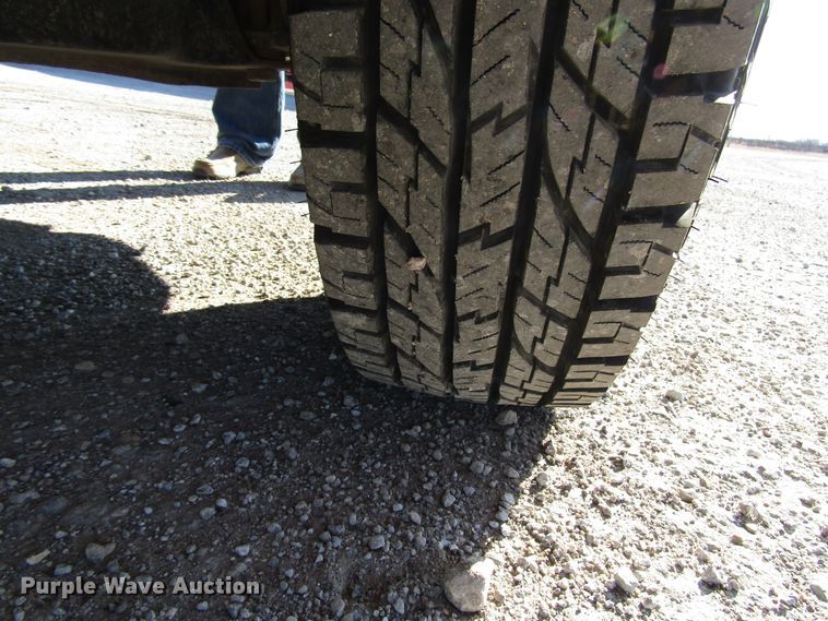 image for item DH8332 1999 Ford F250 Super Duty SuperCab utility bed pickup truck