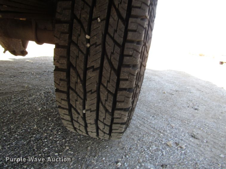 image for item DH8332 1999 Ford F250 Super Duty SuperCab utility bed pickup truck