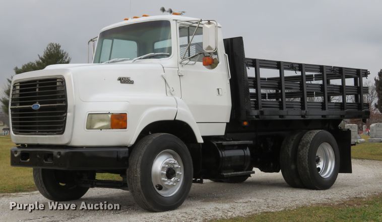 image for item DI2022 1993 Ford L8000 AeroMax flatbed truck
