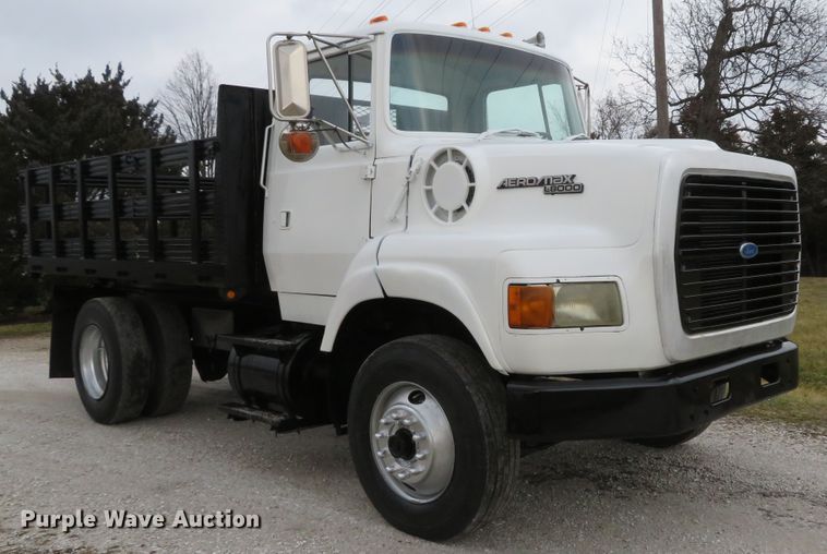 image for item DI2022 1993 Ford L8000 AeroMax flatbed truck