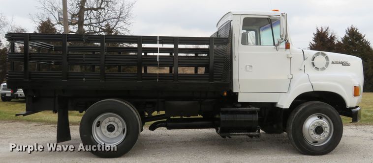 image for item DI2022 1993 Ford L8000 AeroMax flatbed truck