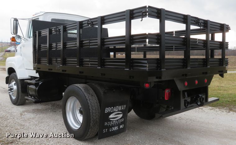 image for item DI2022 1993 Ford L8000 AeroMax flatbed truck