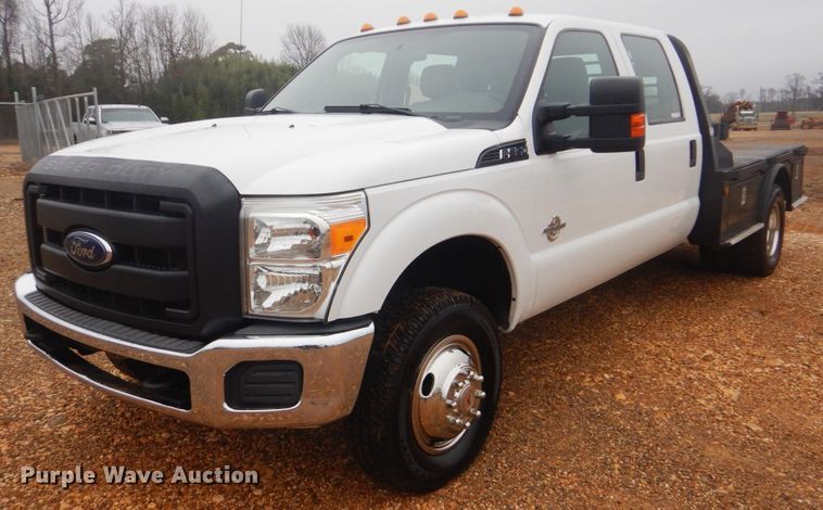 image for item FF9229 2015 Ford F350 Super Duty Crew Cab flatbed pickup truck