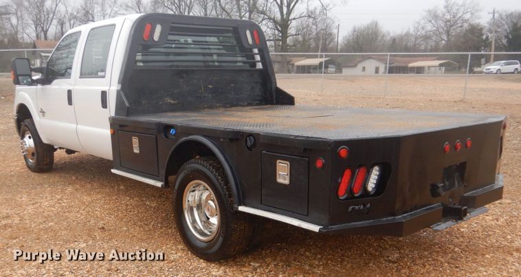image for item FF9229 2015 Ford F350 Super Duty Crew Cab flatbed pickup truck