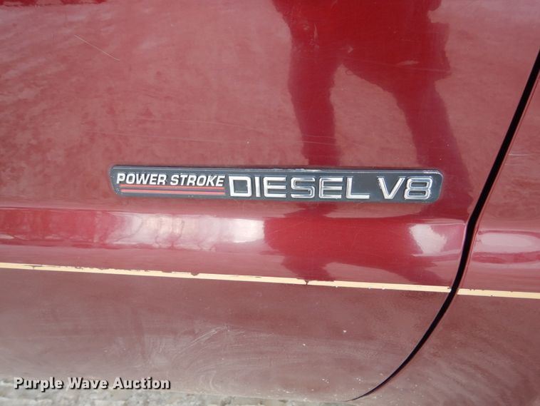 image for item FU9117 2000 Ford F350 Super Duty Crew Cab dump bed pickup truck