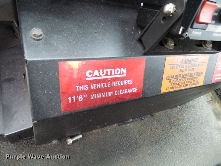 image for item DD1996 2003 Freightliner FC70 street sweeper truck