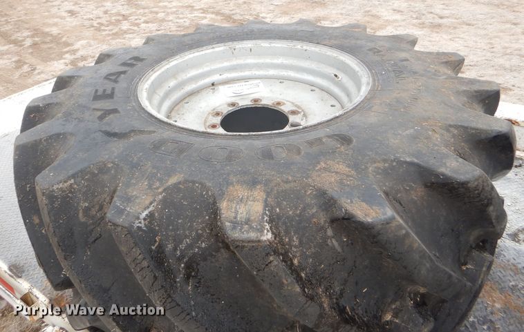 image for item DE1359 (2) Goodyear 800/65R32 tires and wheels