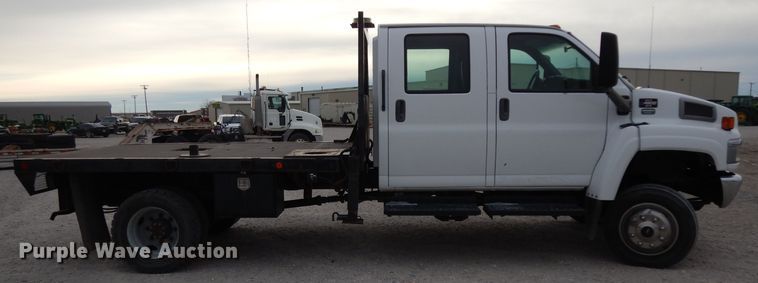 image for item DH2259 2006 GMC C4500 Crew Cab flatbed truck
