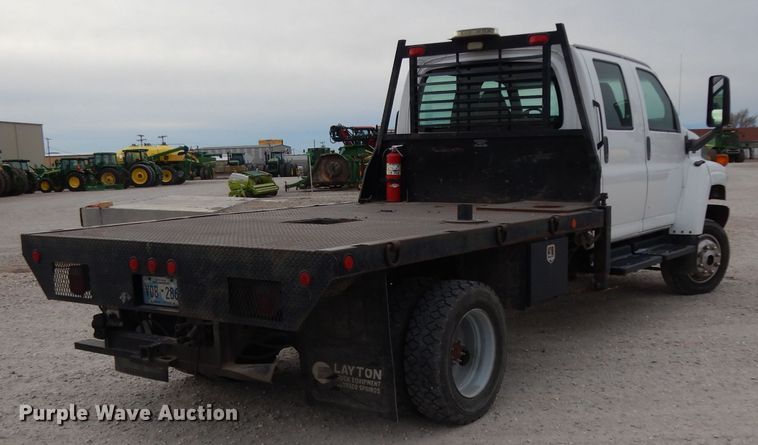 image for item DH2259 2006 GMC C4500 Crew Cab flatbed truck