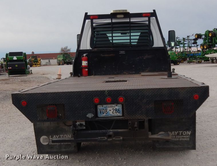 image for item DH2259 2006 GMC C4500 Crew Cab flatbed truck