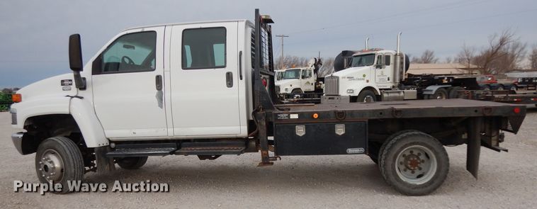 image for item DH2259 2006 GMC C4500 Crew Cab flatbed truck