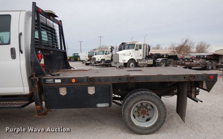 image for item DH2259 2006 GMC C4500 Crew Cab flatbed truck