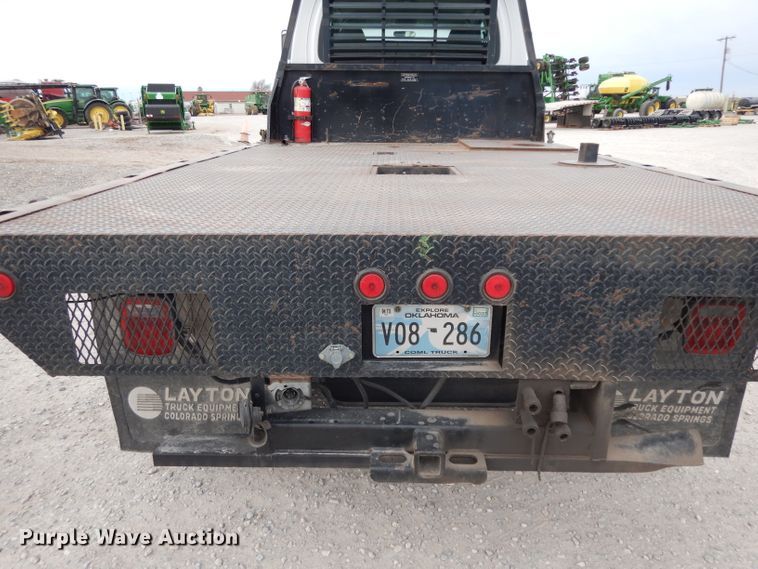 image for item DH2259 2006 GMC C4500 Crew Cab flatbed truck