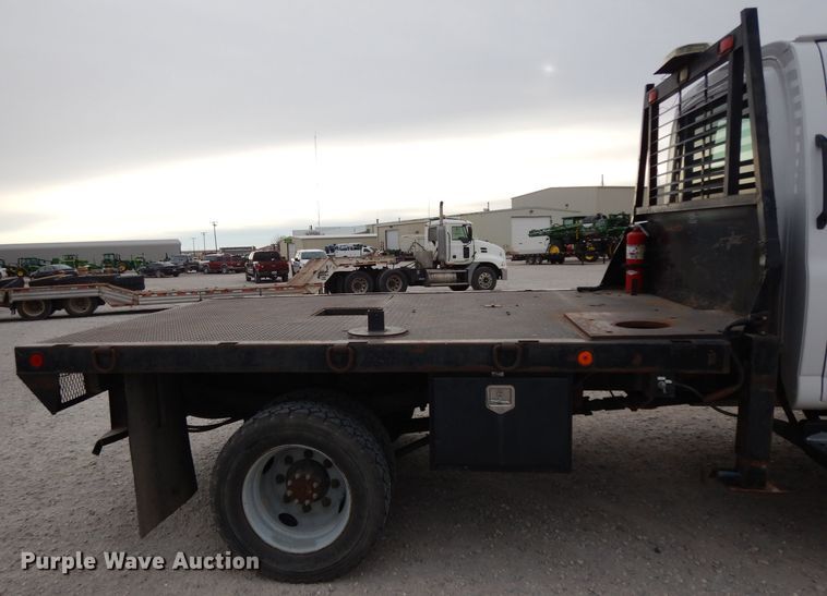 image for item DH2259 2006 GMC C4500 Crew Cab flatbed truck