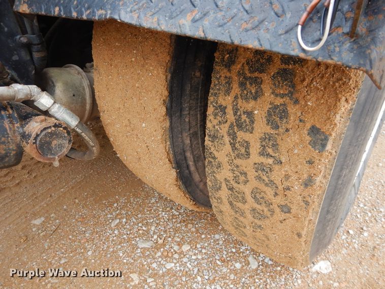 image for item DH3682 2006 Freightliner Business Class M2 roll off container truck