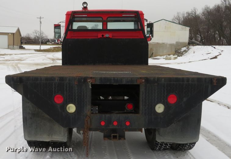 image for item DI2025 2003 Freightliner FL70 flatbed truck